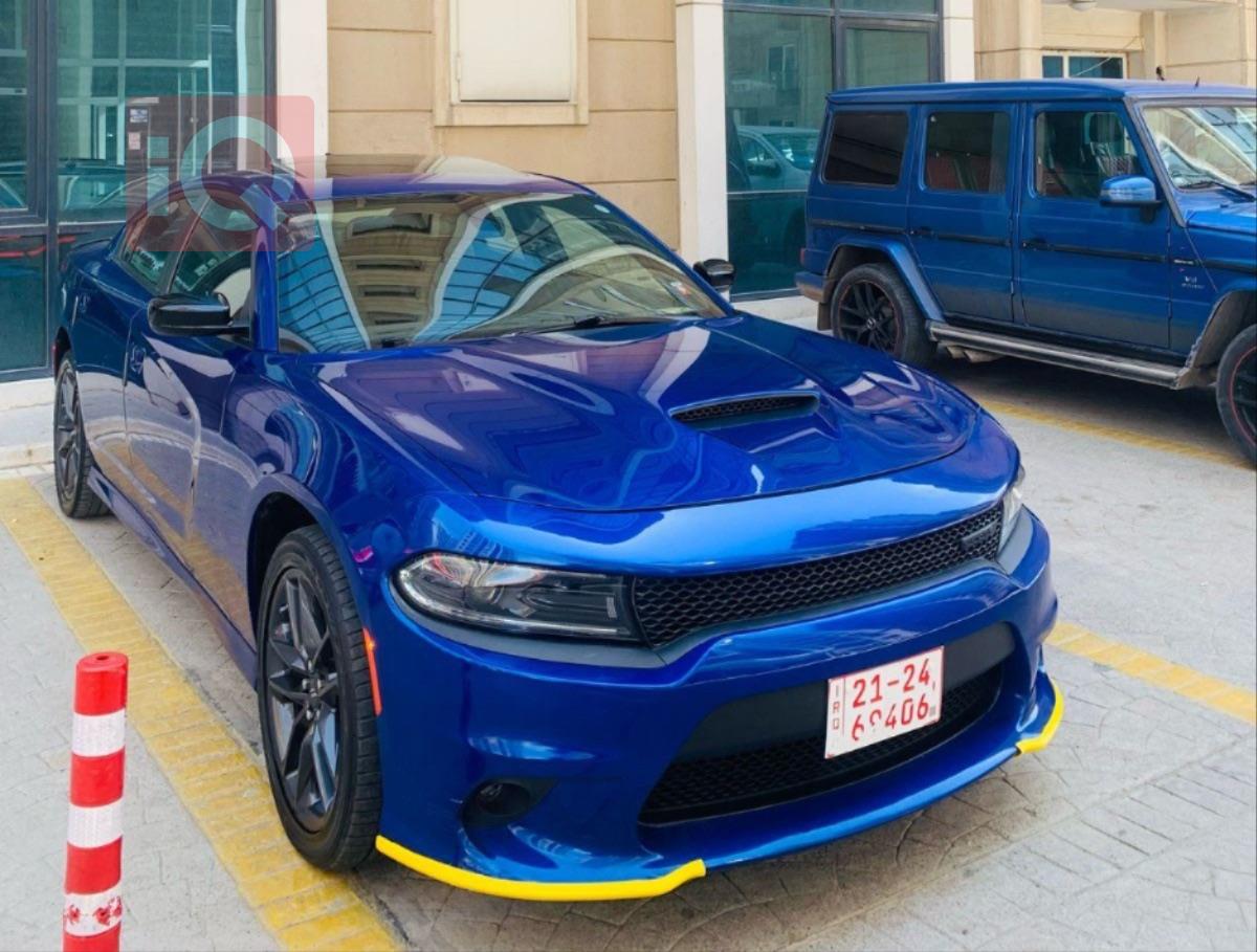 دۆج چارجەر